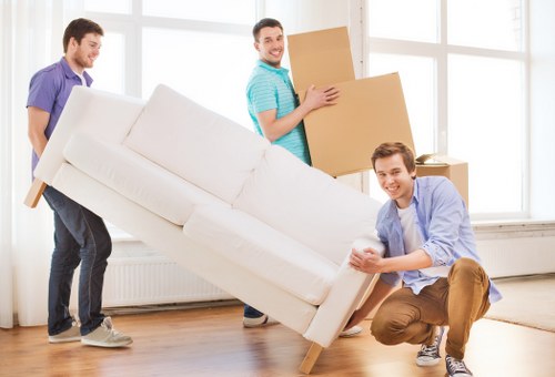 A local office removal team handling desks and furniture