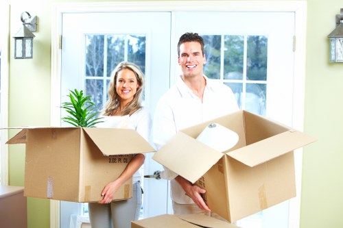Careful furniture handling during a flat removal in Brompton