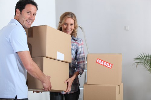 Preparing boxes and furniture for a Brompton moving truck